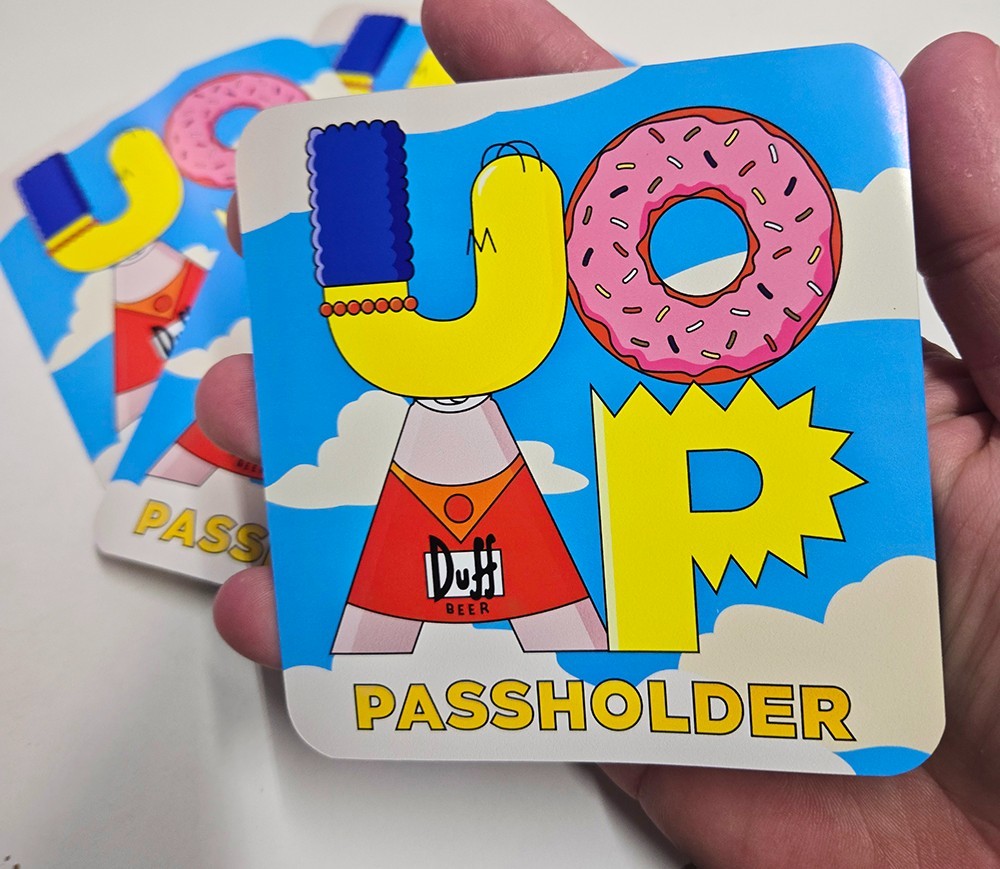 RARE! Universal Passholder (UOAP) magnet featuring a Simpsons! (Aftermarket!)