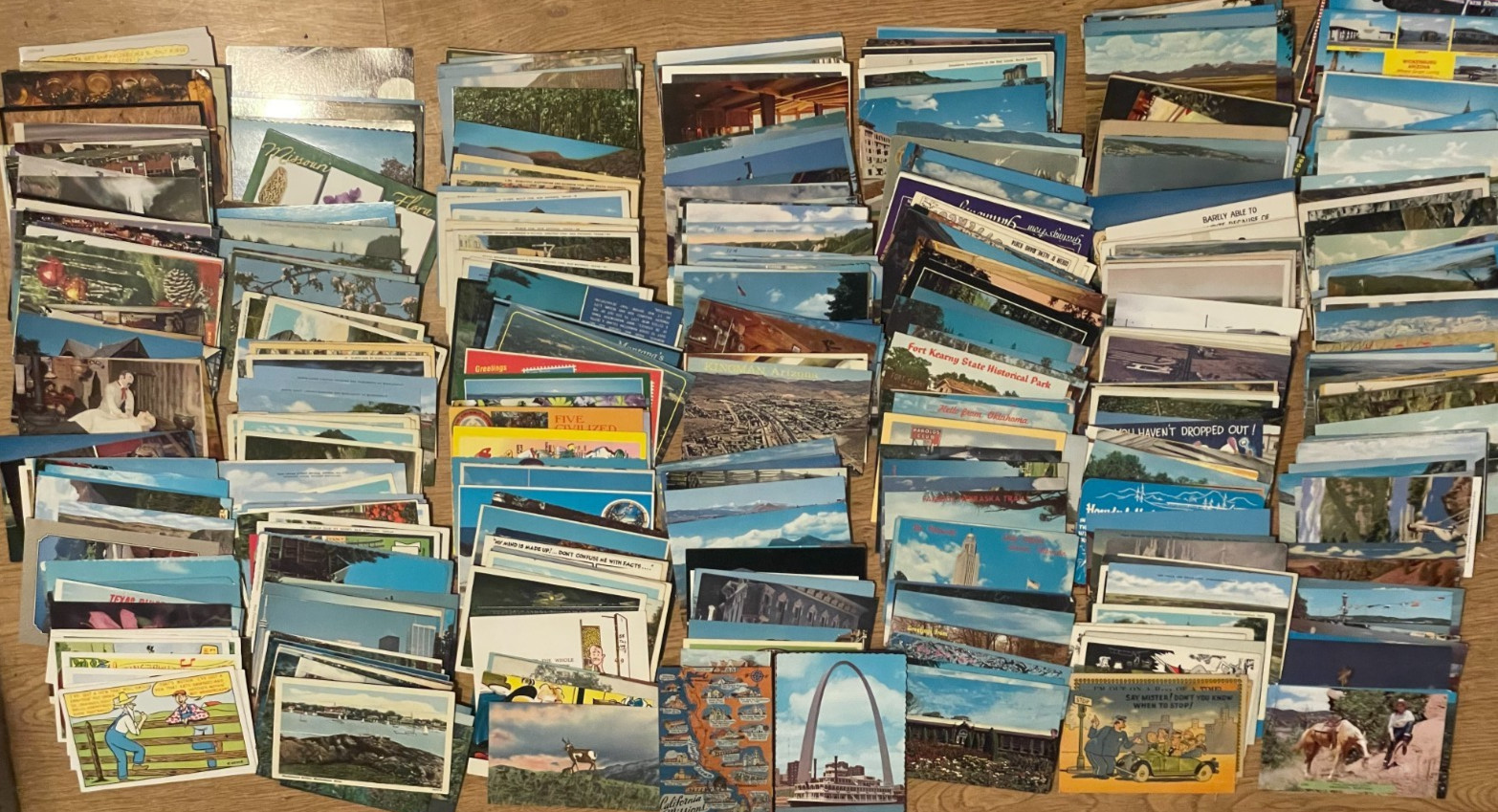 690 different unused US and some Canada picture postcards – Great variety