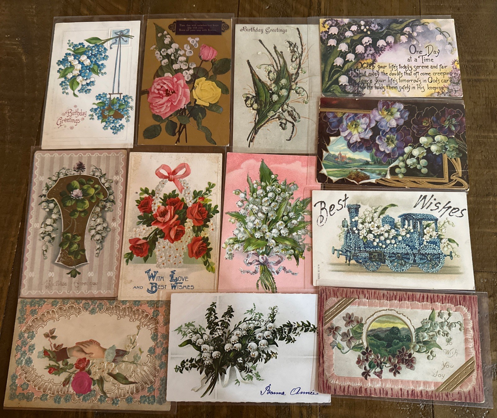 Pretty Lot of 12 Antique Greetings Postcards w. Lily of the Valley Flowers~r869