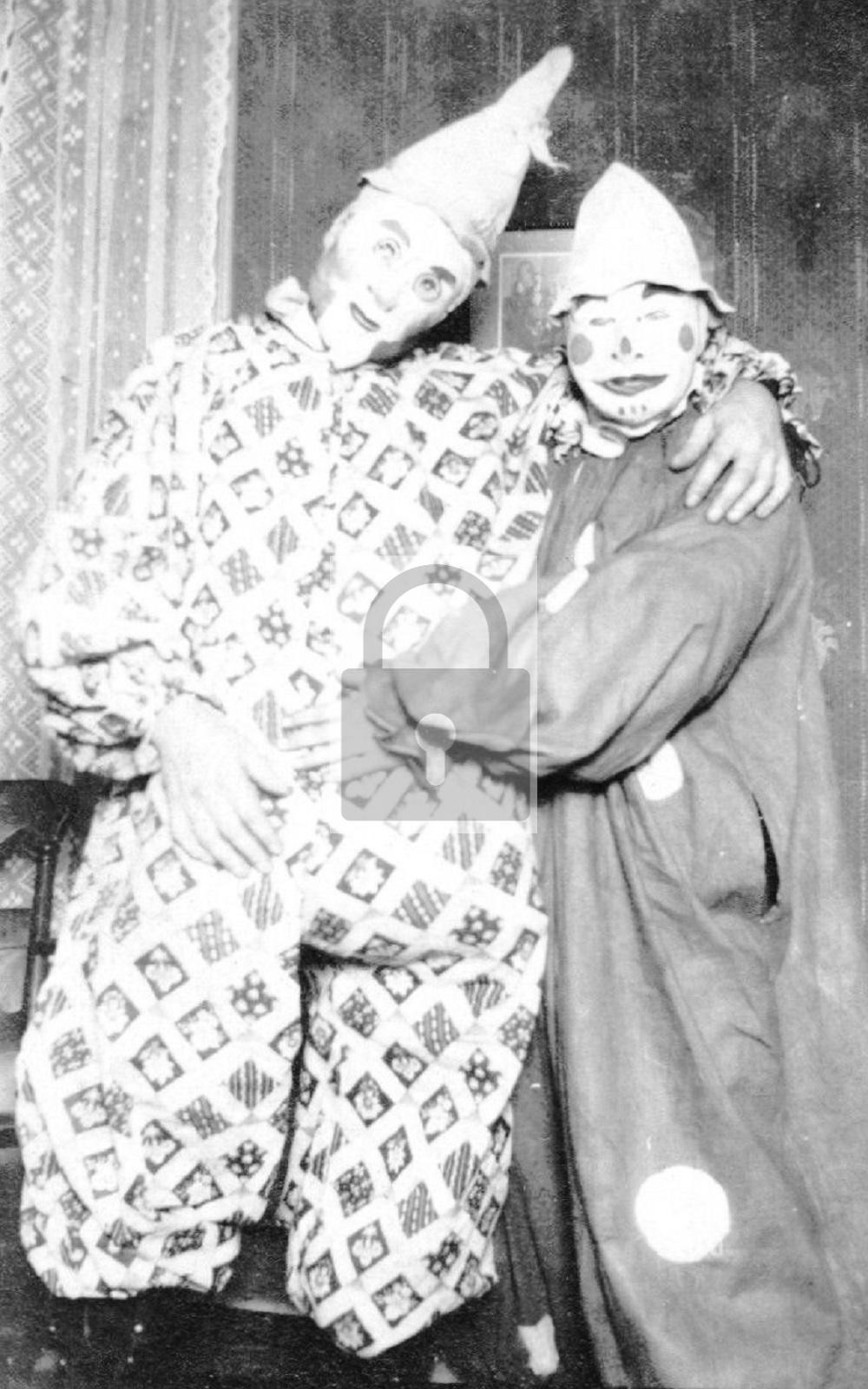 Two People Posing In Creepy Weird Clown Halloween Costumes – Reprint