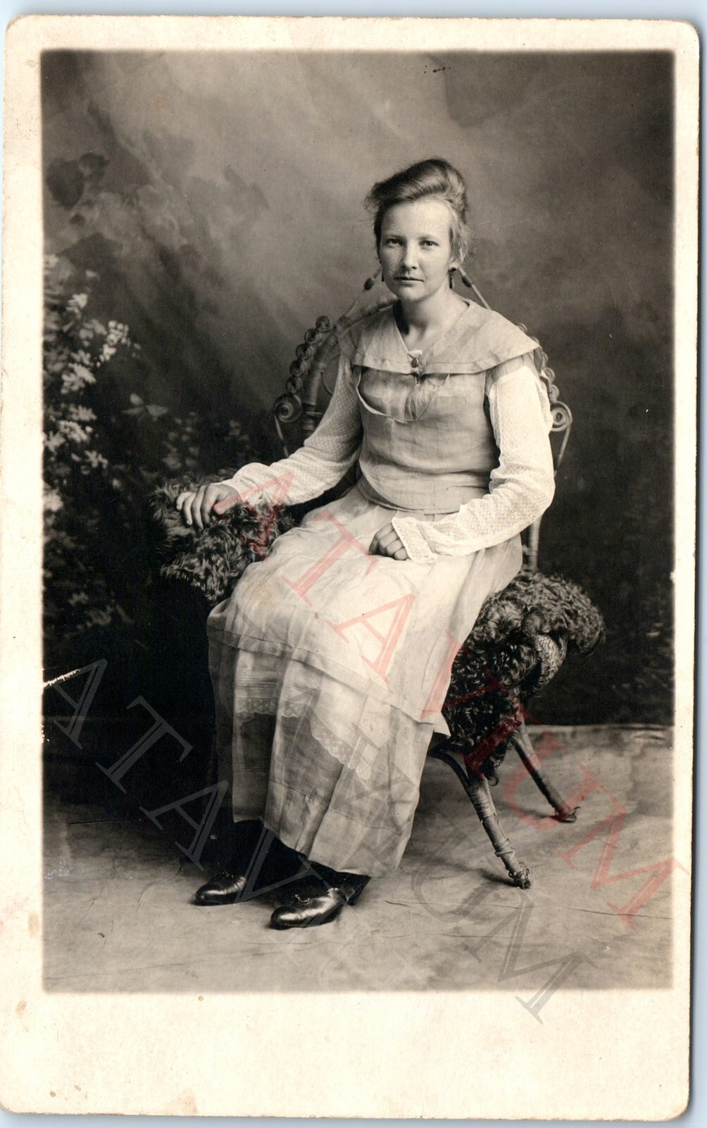 c1920s Young Woman Seated RPPC Postcard Wicker Chair Portrait Unique Sleeves