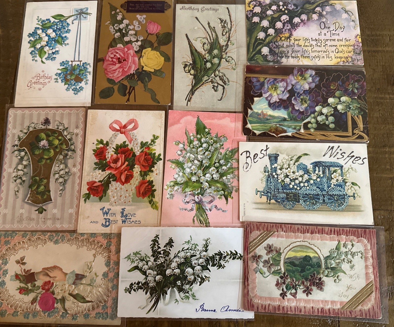 Pretty Lot of 12 Antique Greetings Postcards w. Lily of the Valley Flowers~r869