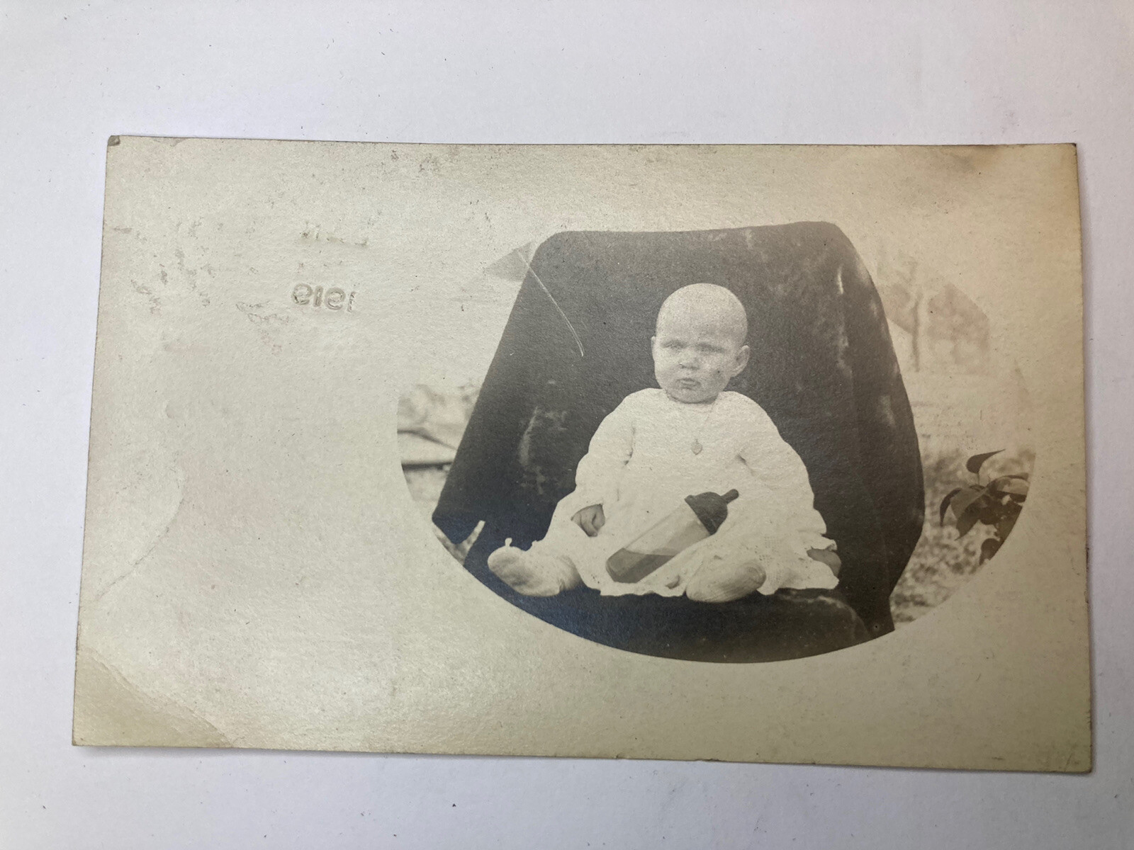 c1919 Baby w/ Bottle, A Little Creepy ANTIQUE Postcard Red 2c