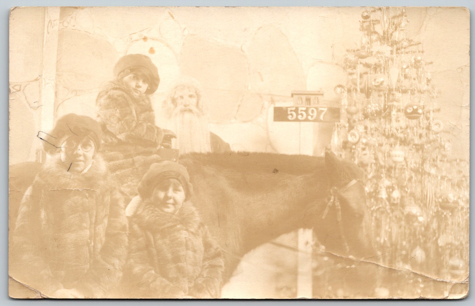 RPPC Creepy Santa w/ Children on Horse by Christmas Tree ANTIQUE Postcard 10037
