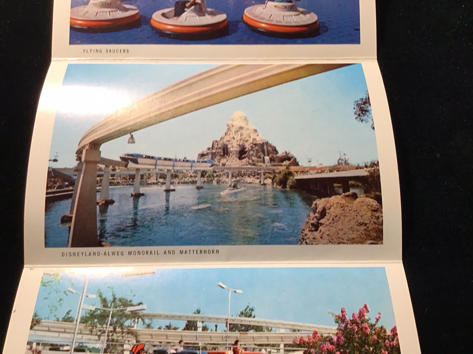 VTG WALT DISNEY DISNEYLAND POSTCARD FOLDER BOOKLET 12 VIEWS TOMORROWLAND RIDES