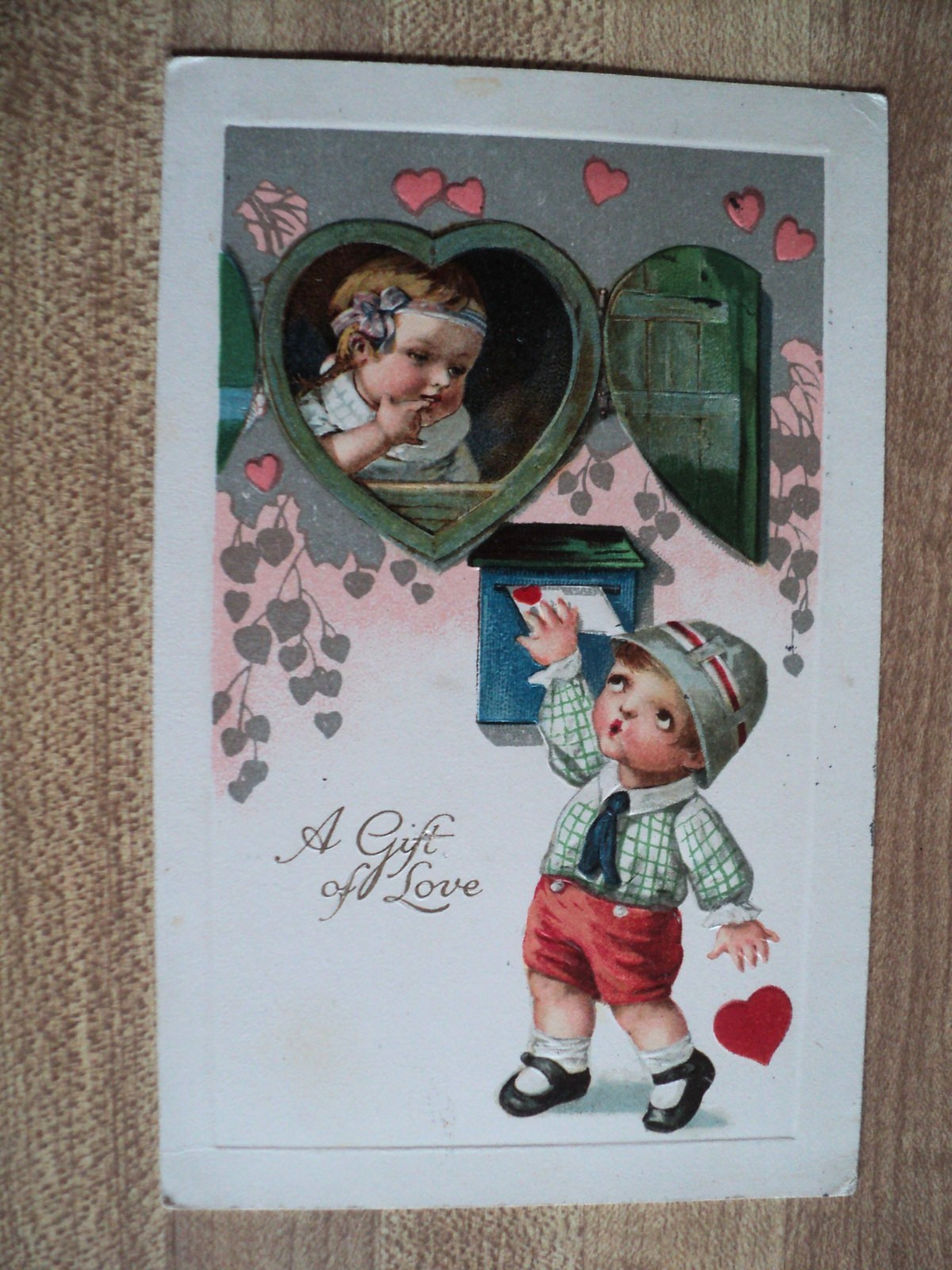 VALENTINE’s Day Boy puts Card in Mailbox vintage Winsch 420 embossed Postcard
