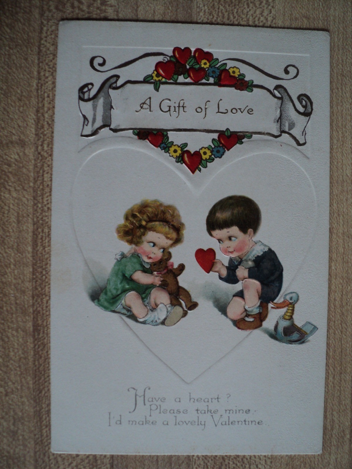 VALENTINE’s Day Girl w/ Teddy Bear vintage Winsch 420 embossed Postcard