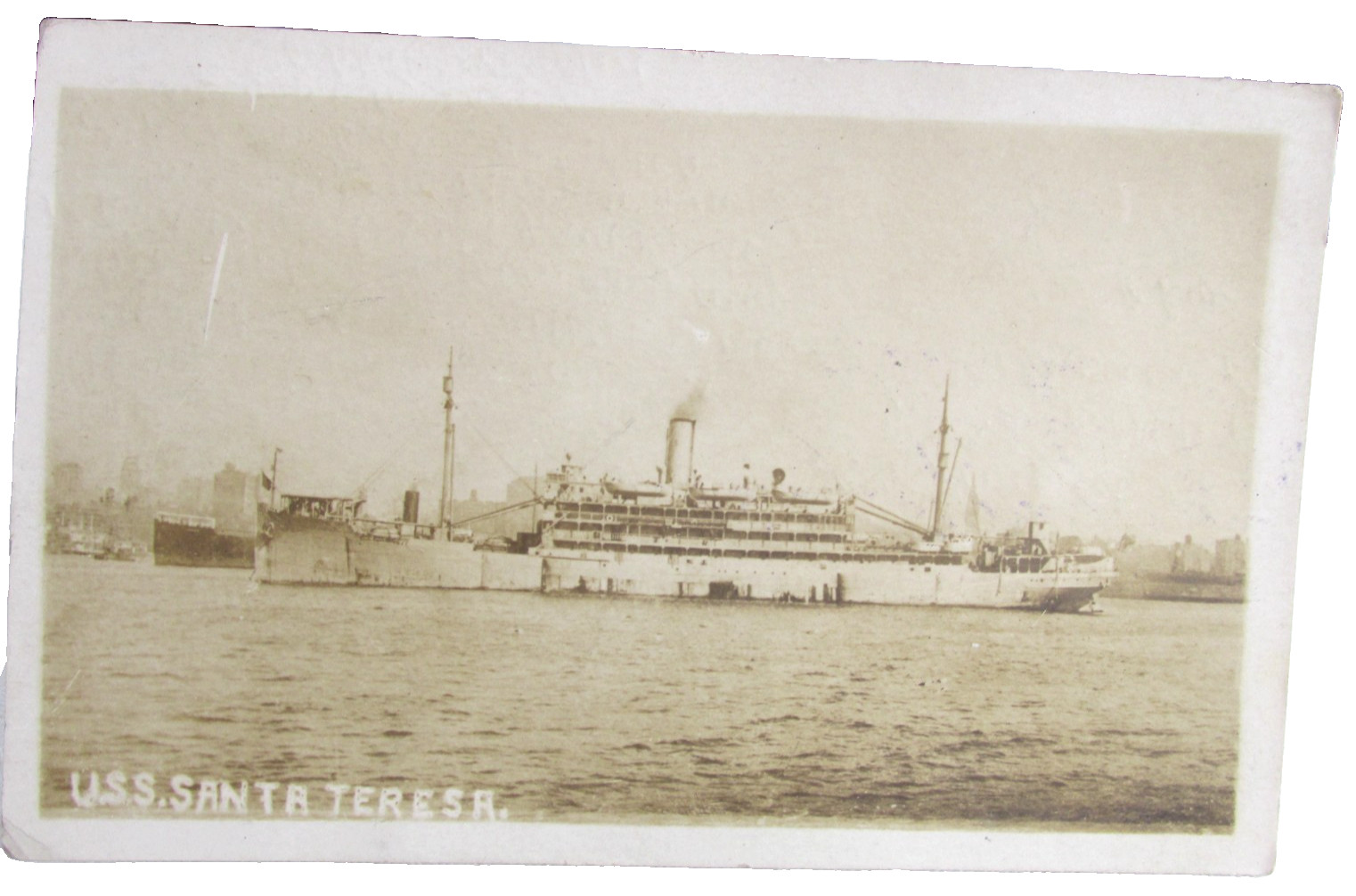 1919 RPPC REAL PHOTO POSTCARD USS SANTA TERESA NAVY TRANSPORT SHIP camp Merritt